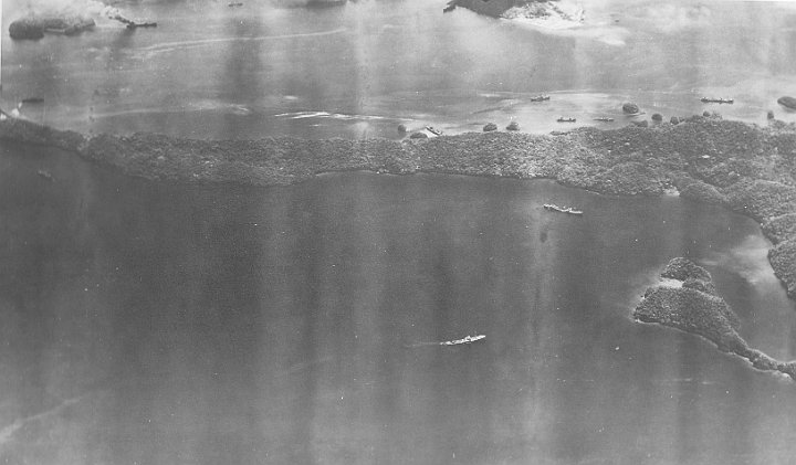 attack on palau-05.JPG - Amatsu Maru on fire (upper left) with Sata (centre) down by the stern and trailing an oil slick